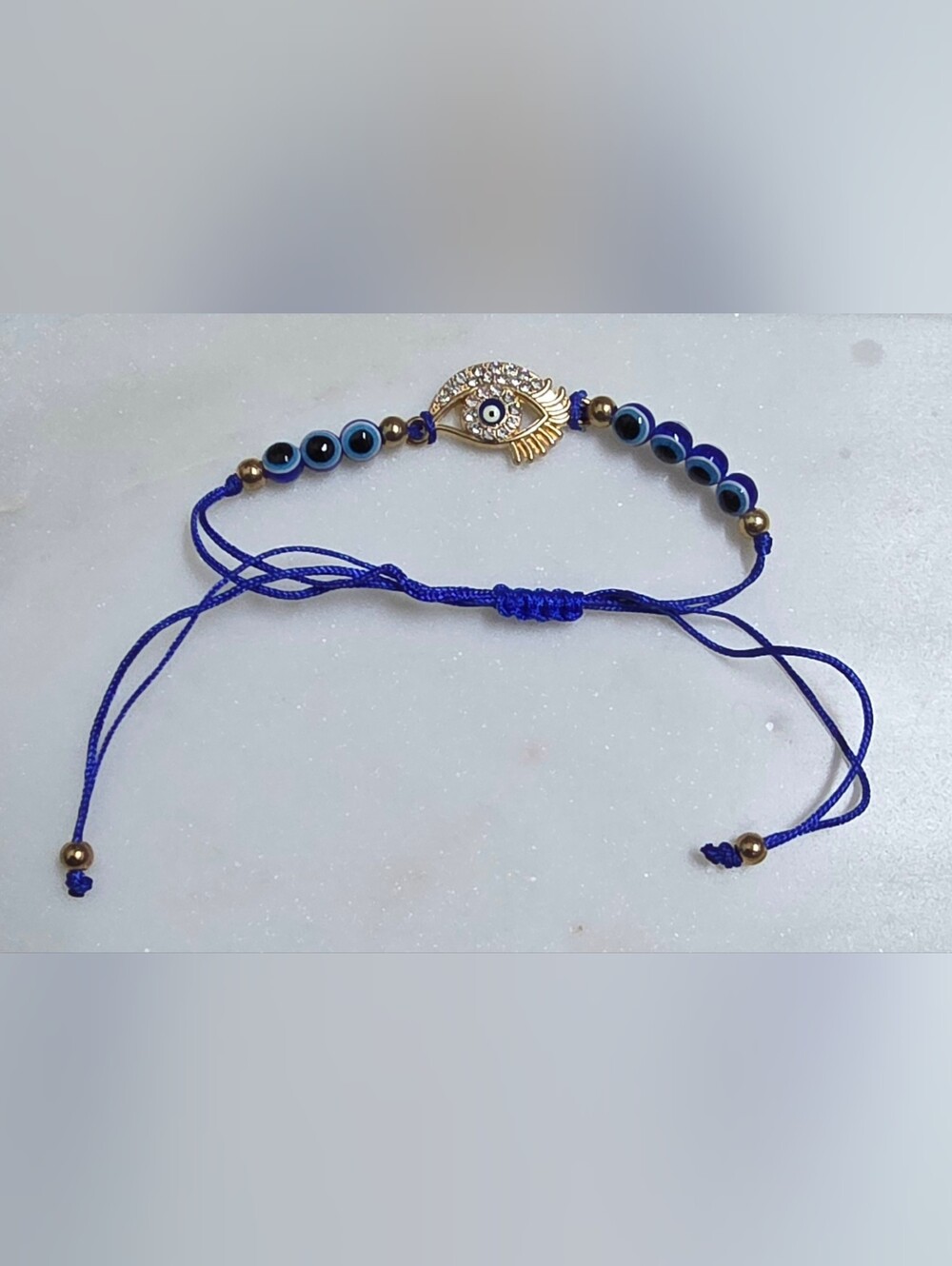 Hand Crafted Crystal Blue Evil Eye Adjustable Bracelet with Gold Accents NWOT